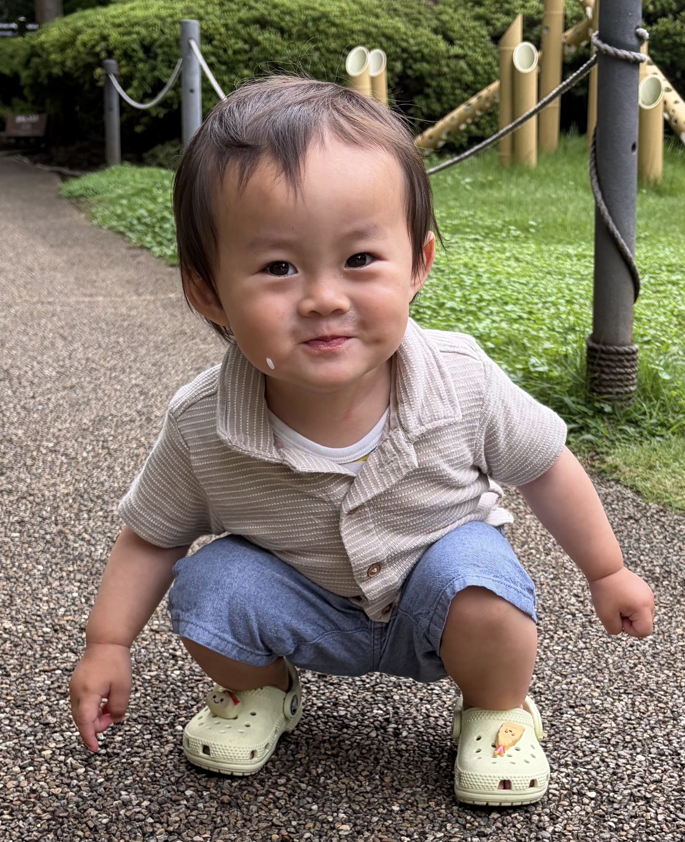 A young child playing outdoors
